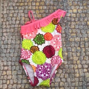 Ruffle shoulder bathing suit. Never worn. Sz 12 mo
